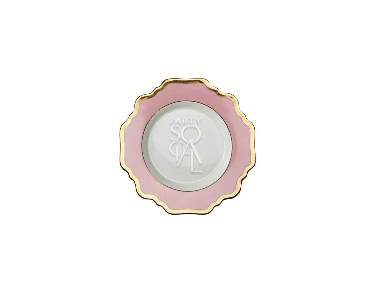 Pink Lotus Collection decorative plate with scalloped edge, pink rim, gold border, and PARTY SOCIAL centered, ideal for elegant dining and upscale events.