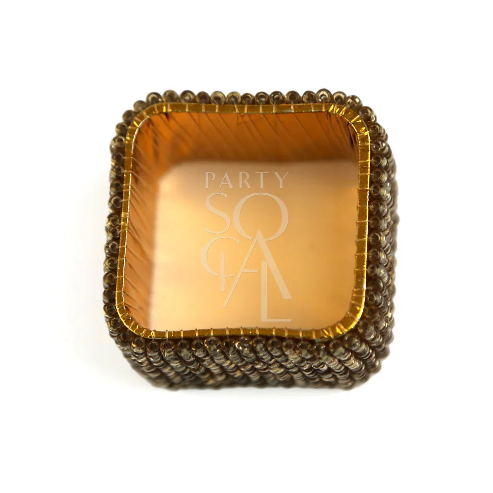 NAPKIN RING - GOLD BEADED: A square gold container showcasing a beaded napkin ring, perfect for enhancing elegant tablescapes at any event.