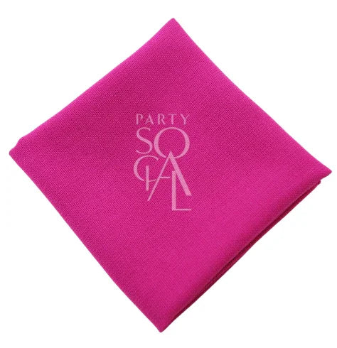 NAPKIN COTTON LINEN featuring a white logo on a pink surface, ideal for enhancing table settings at events like weddings or corporate gatherings.