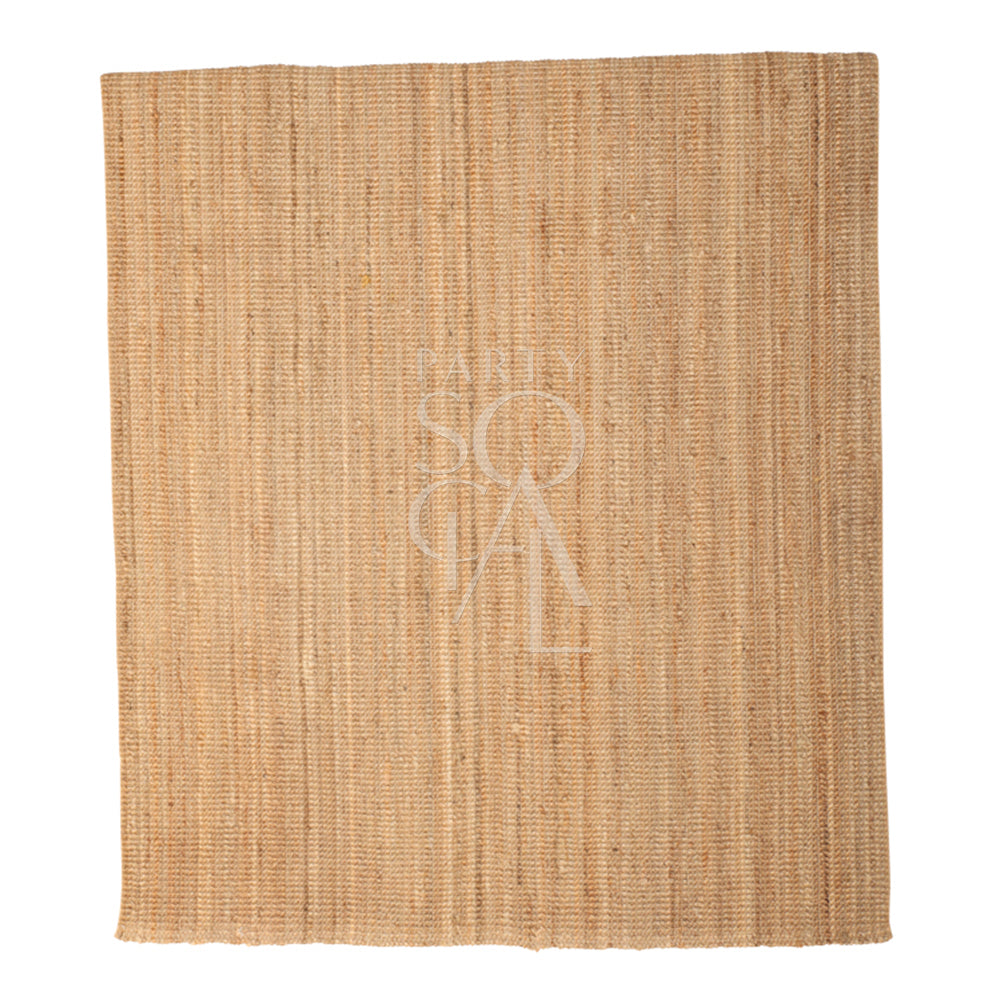 RUG NATURAL JUTE: A close-up of the textured jute rug, ideal for enhancing any event ambiance with its elegant fabric detail, perfect for parties and gatherings.