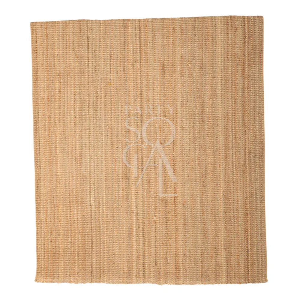 RUG NATURAL JUTE: A close-up of the textured jute rug, ideal for enhancing any event ambiance with its elegant fabric detail, perfect for parties and gatherings.