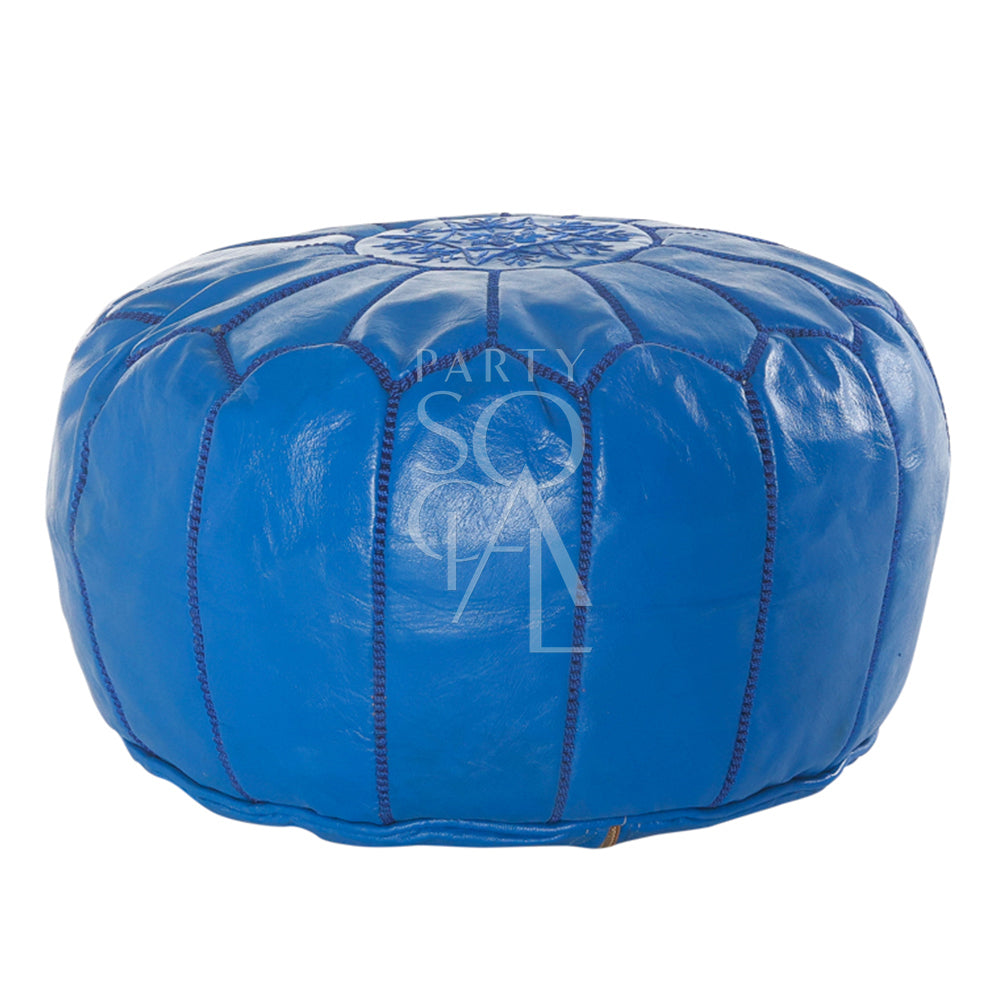 Moroccan Leather Pouf: Blue leather pouf with stitched edges, versatile for seating or as a small table, perfect for enhancing event and party decor.