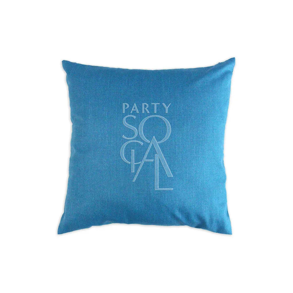 CUSHION COVER LINEN BLEND featuring a blue pillow design with a logo, suitable for event decor. Available in 40cm or 60cm sizes.