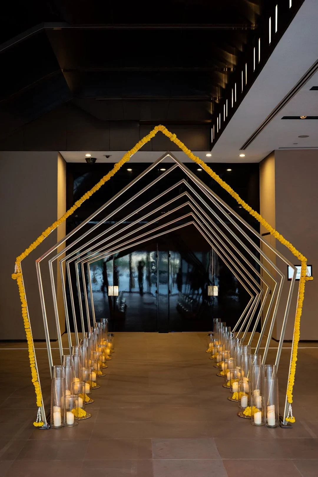 PENTAGON TUNNEL WITH COLOR CHANGING LED displayed in an elegant row, perfect for vibrant party entrances, showcasing dynamic lighting features.