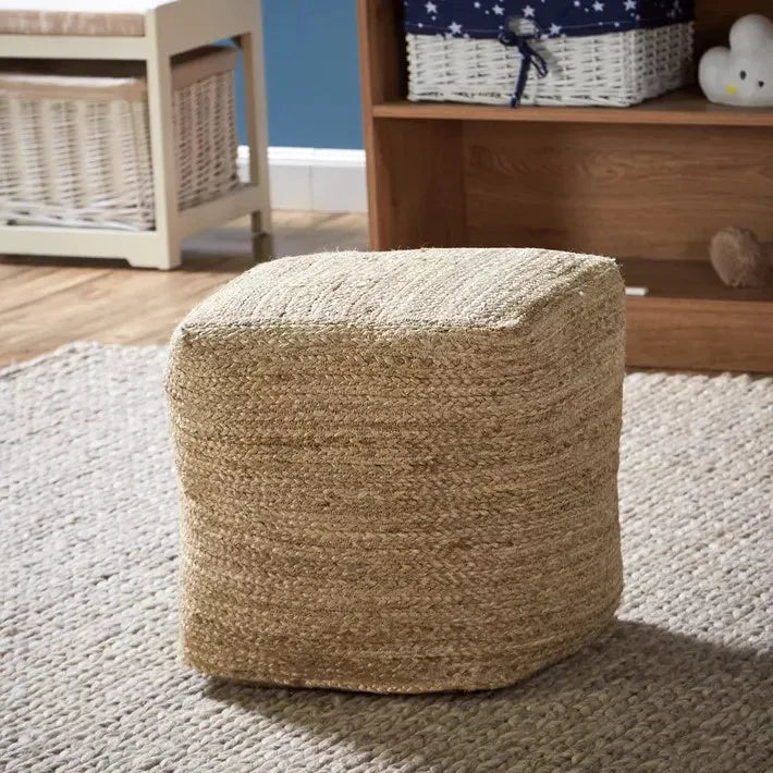 FABRIC & JUTE POUFS on a rug, showcasing a woven square design, ideal as a decorative, functional element for events or home use.
