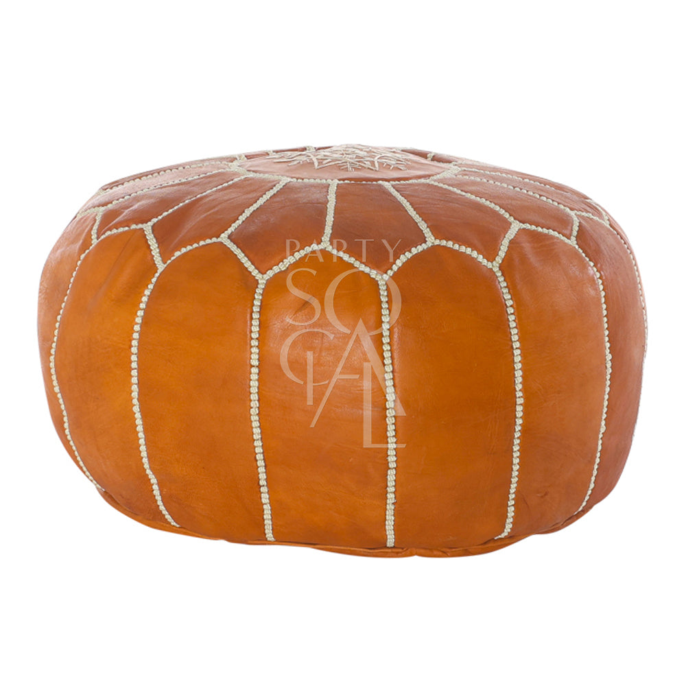 MOROCCAN LEATHER POUFS: Elegant brown leather pouf with white stitching, versatile for seating or decor, perfect for enhancing party and event settings.