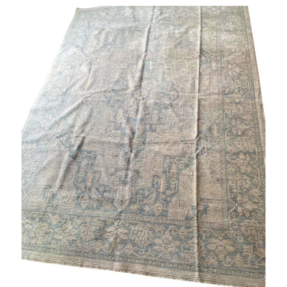 RUG VINTAGE PATTERN: A large rectangular area rug with a faded, vintage medallion and floral motif, ideal for adding elegance to event spaces.