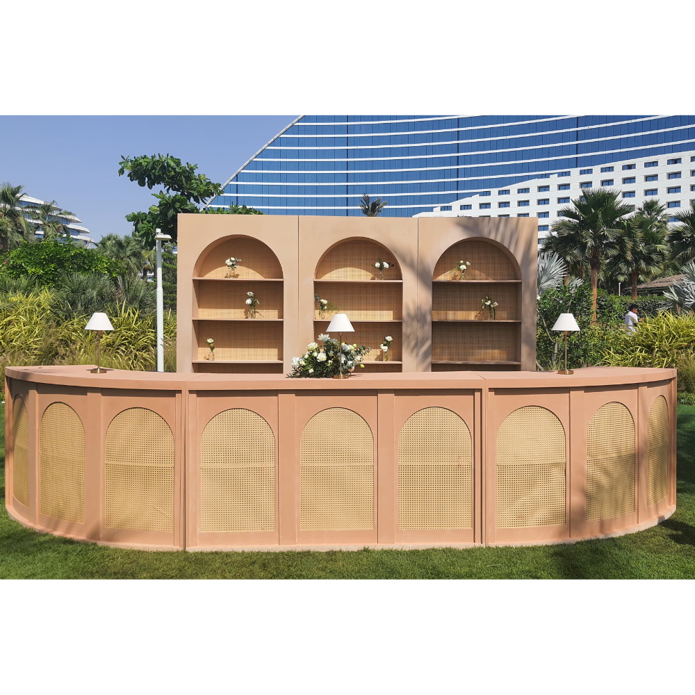 Wooden Rattan Bar Unit for rent, showcasing quality craftsmanship with a rich finish, ideal for adding elegance to events and gatherings.