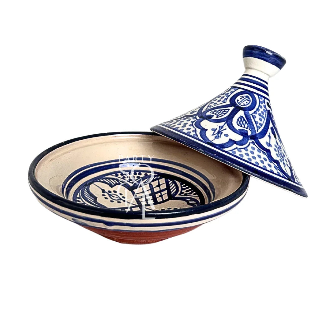 Marrakesh Tagine: Blue and white ceramic tagine, ideal for enhancing table settings at parties or events with a blend of style and functionality.