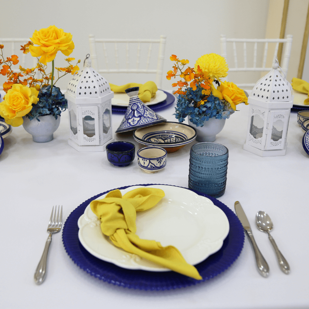 CHARGER PLATE - ULTRAMARINE LINED displayed on a table with elegant tableware, featuring a premium lined glass design, perfect for enhancing any event setting.