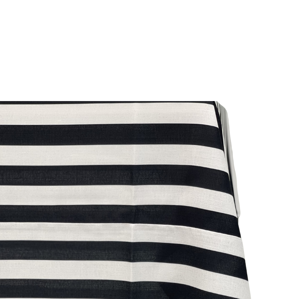 Black & White Linen Tablecloth draped over a table, showcasing its premium polyester fabric and elegant striped design, ideal for enhancing any event setting.