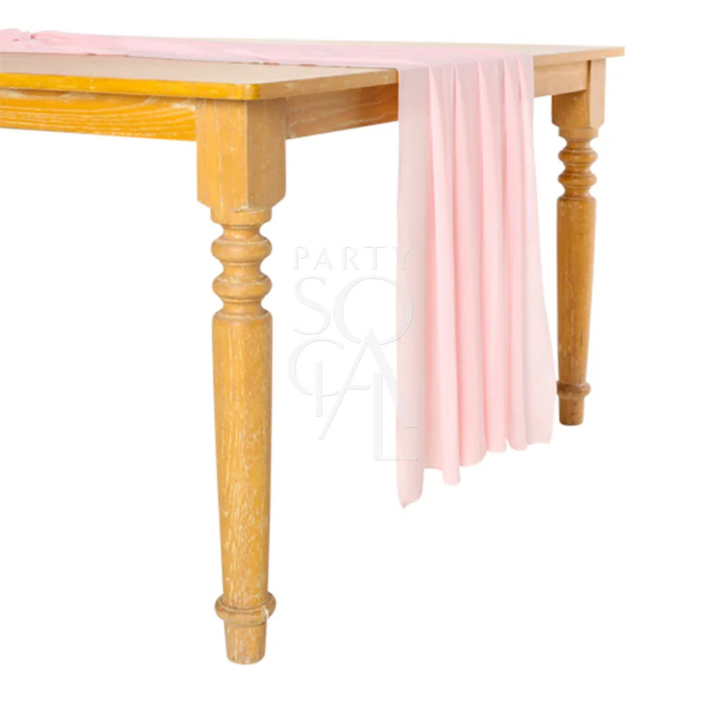 Chiffon Table Runner displayed on a table, ideal for enhancing glamorous tabletops at events and special occasions.