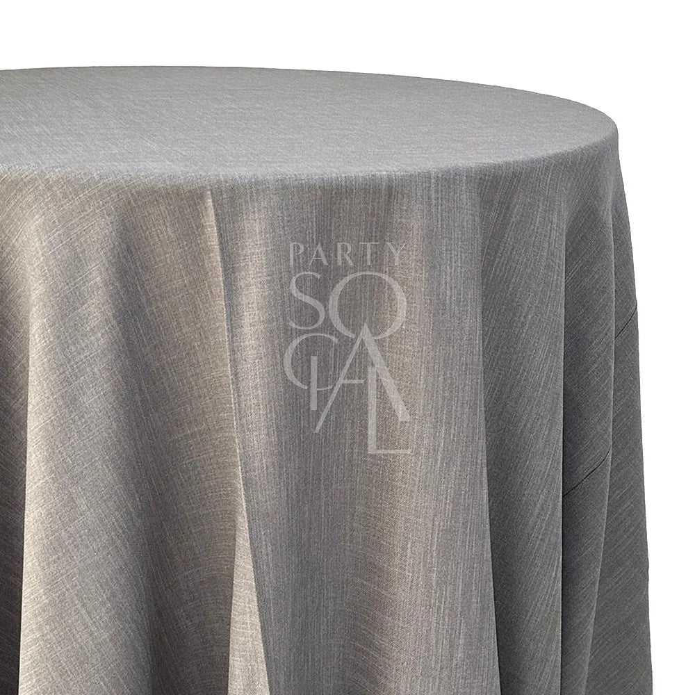 ROUND TABLECLOTH LINEN BLEND displayed on a round table, ideal for enhancing special occasions with elegant linen texture, available in various colors from Party Social.