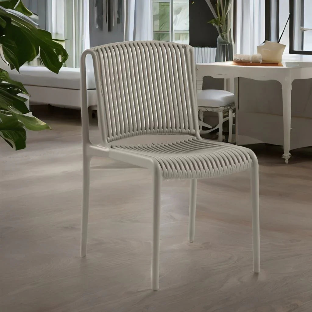 LINED TAUPE CHAIR in a room setting, showcasing its modern plastic design, ideal for weddings and corporate events.