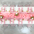 Pink Balloon Runner on a table setup, featuring pink and white striped napkins and clear chairs, ideal for kids&