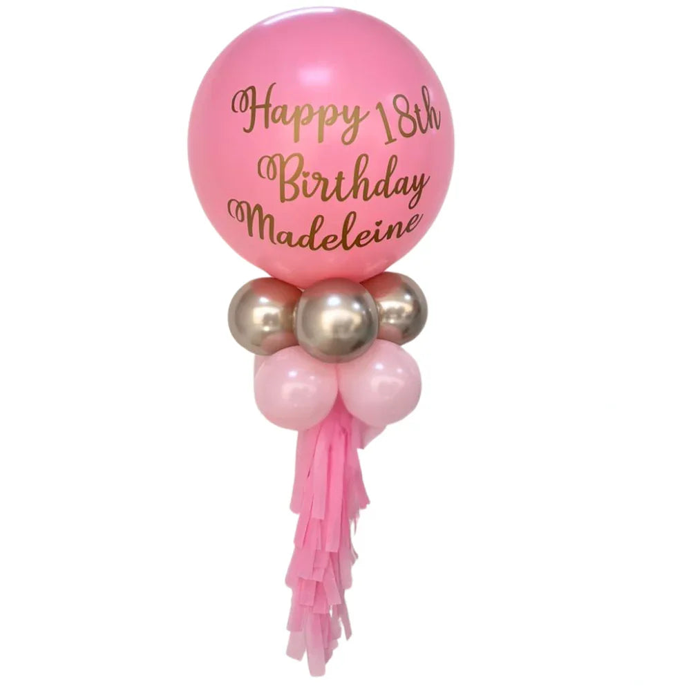 Personalized Birthday Balloon Wand featuring a vibrant 24-inch pink balloon with gold text and coordinating 12-inch pink balloons, ideal for memorable party photos.