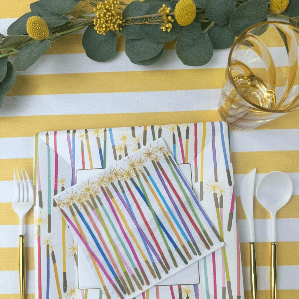 Caspari Party Candles Paper Luncheon Napkins - 20 Per Package. Elevate your tabletop with triple-ply napkins featuring artwork from global artists. Eco-friendly, FSC-certified, and compostable. From Party Social.