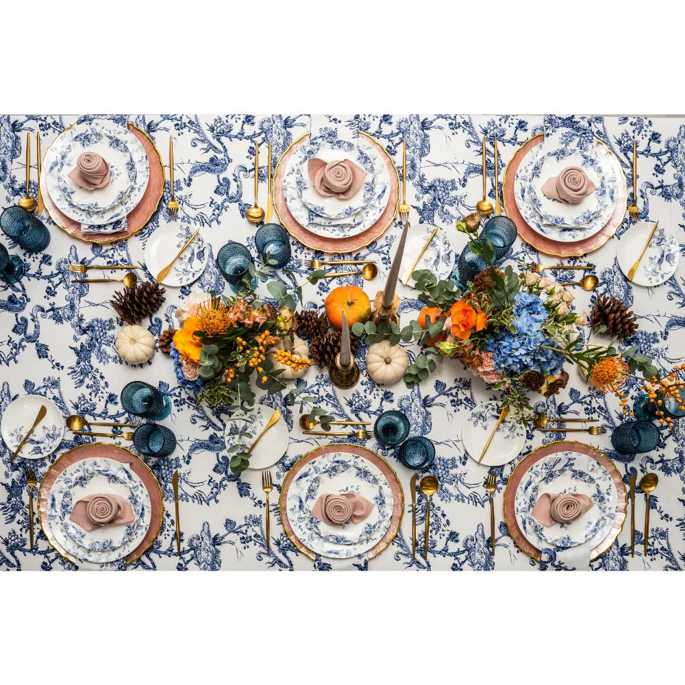 TOILE DE JOUY PRINT RECTANGULAR TABLECLOTH elegantly displayed with plates and a floral arrangement, perfect for enhancing any party or special event setting.