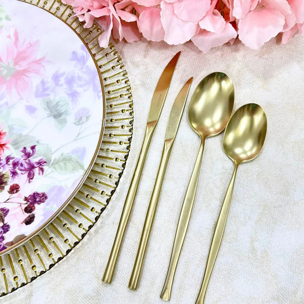 CUTLERY MODERN CHAMPAGNE set, featuring elegant gold utensils including a spoon, fork, and knife, perfect for adding a dramatic touch to any event table.