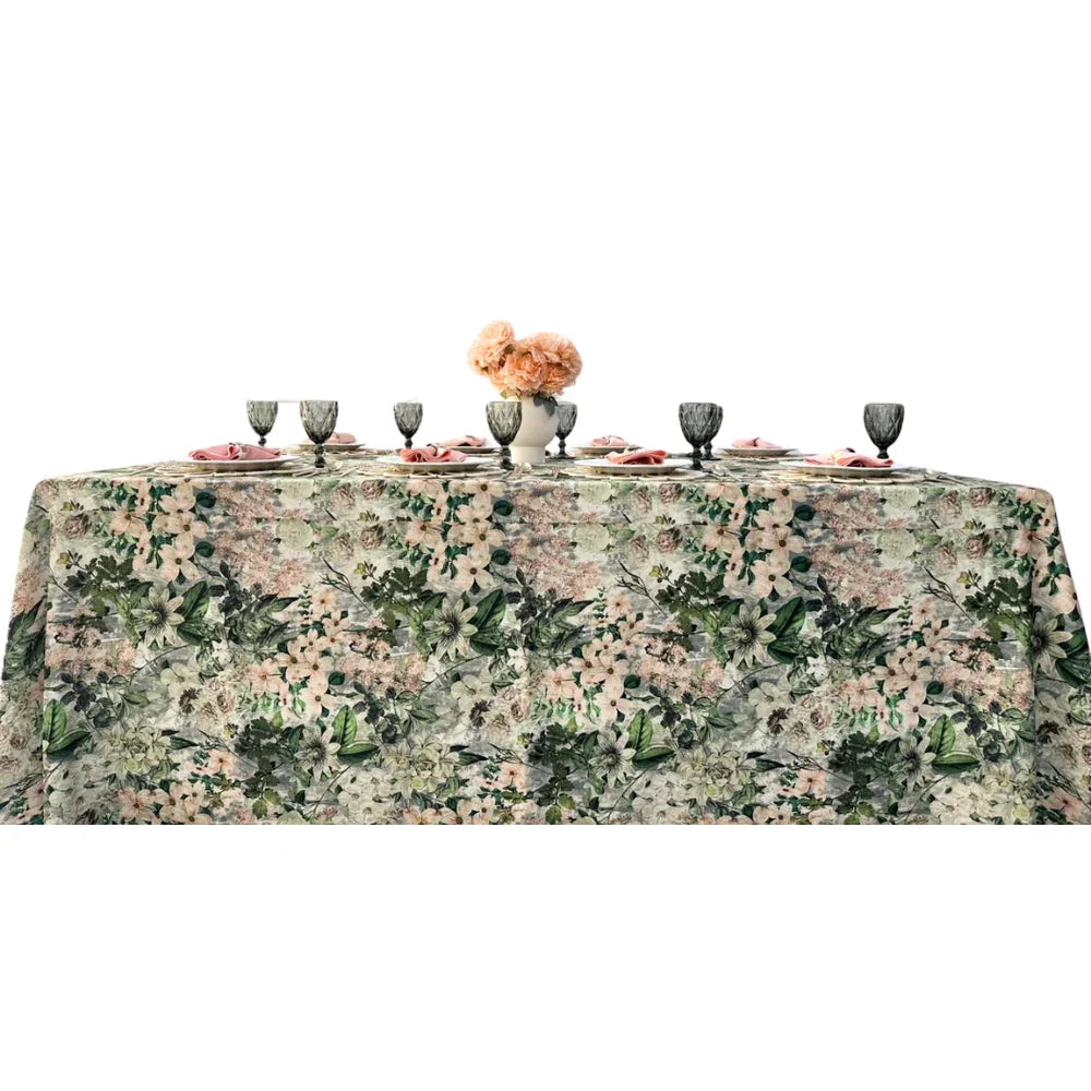 Designer green floral rectangular tablecloth with intricate floral patterns and a vase of flowers, ideal for elegant dining setups at events.