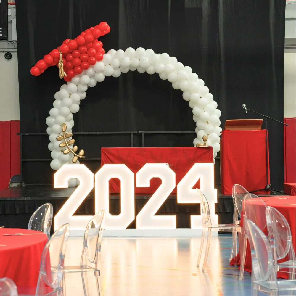 Graduation Cap Round Balloon Arch, ideal for graduation celebrations, featuring a decorative arch made from balloons shaped like a graduation cap.