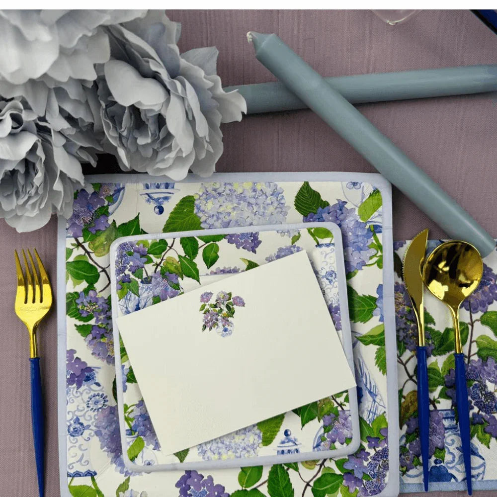 Hydrangeas and Porcelain Blank Correspondence Cards - 20 Per Package: A place setting displaying floral-themed stationery with a card and silverware, perfect for elegant handwritten notes.