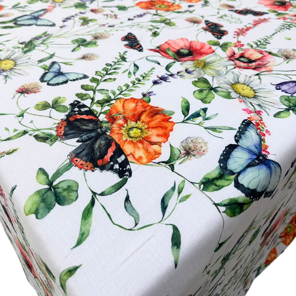 BUTTERFLY MEADOWS RECTANGULAR TABLECLOTH featuring a vibrant butterfly and floral pattern, perfect for enhancing dining setups with a premium look.