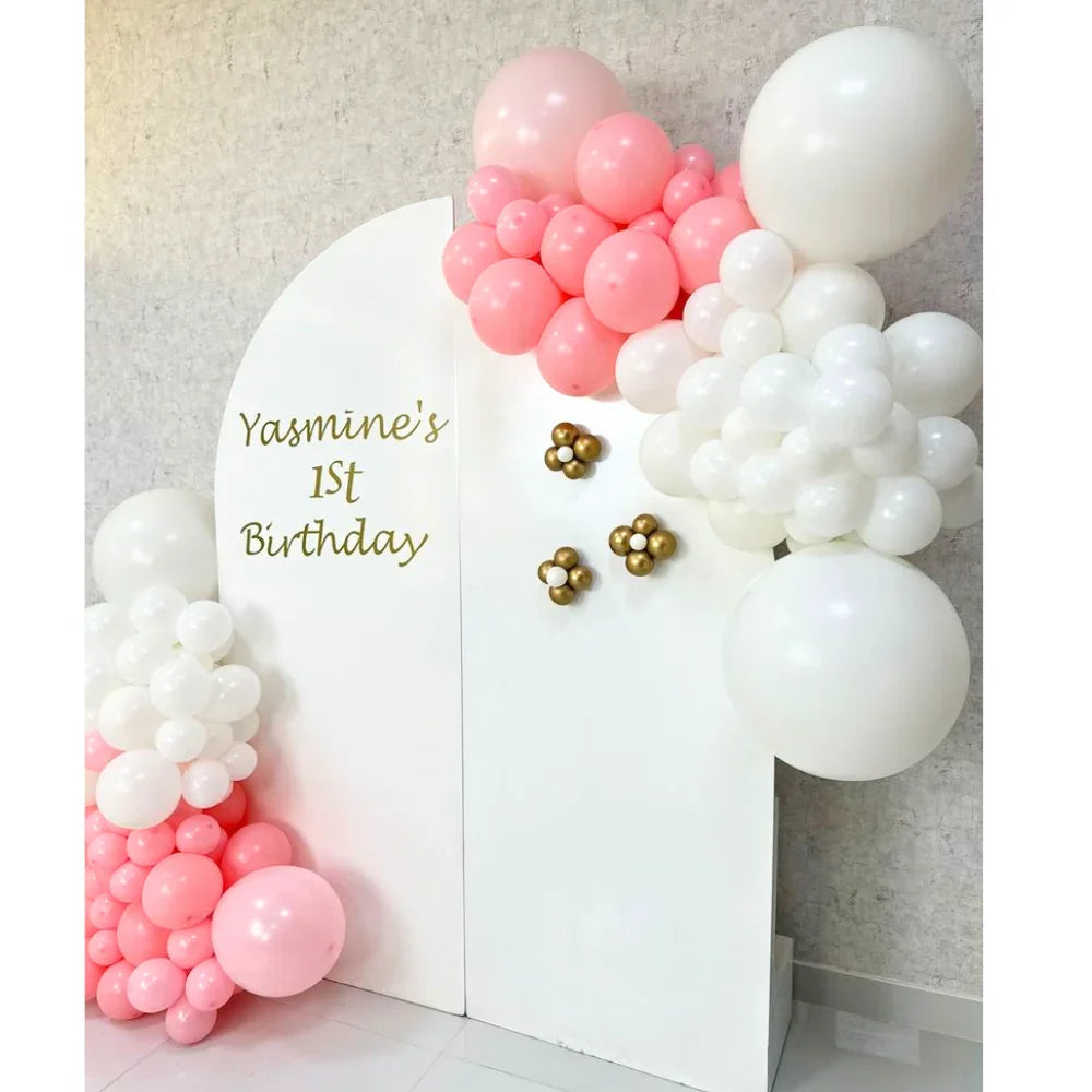 Semi Arches Balloon Backdrop for events, featuring a striking arrangement of pink and white balloons, ideal for enhancing party atmospheres and creating memorable experiences.