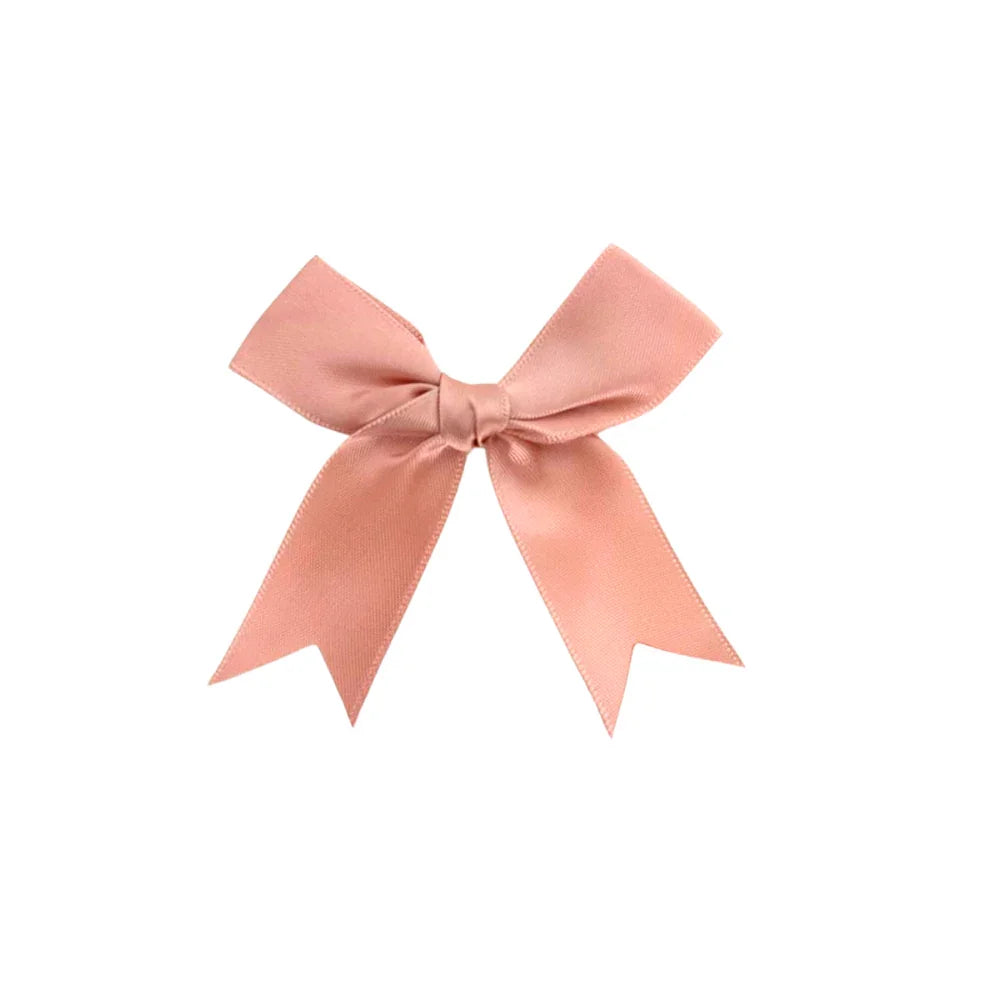 Pink Bow from Party Social, perfect for decorating gifts or party favors, features a neatly tied ribbon bow, ideal for special occasions.