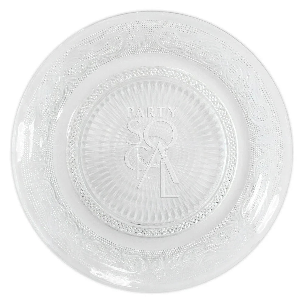 Vintage clear glass plate featuring an engraved design, ideal for enhancing elegant table settings at events or gatherings.