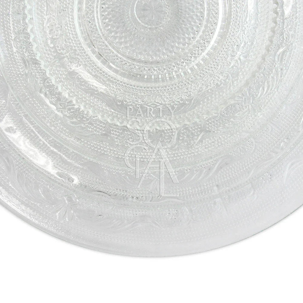 Vintage clear glass plate with etched design, part of a versatile set for elegant table settings, available in various sizes for event hosting.
