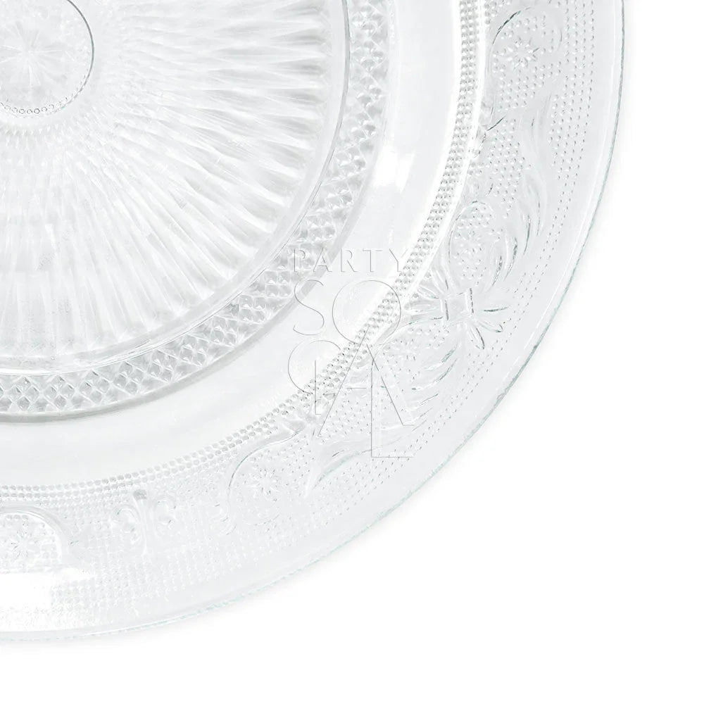 Vintage clear glass plate, intricately etched, perfect for elegant table settings. Available in four sizes: charger, dinner, dessert, and B&B. Ideal for special occasions.
