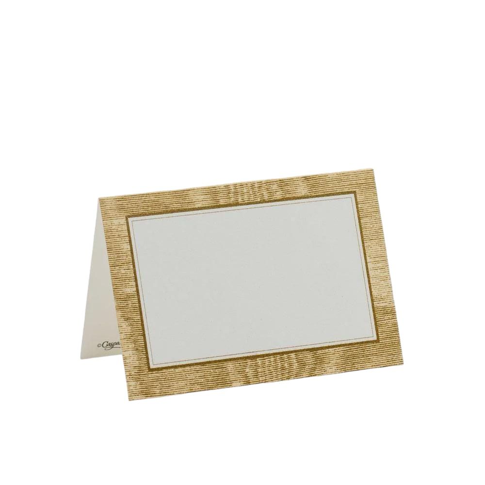 A close-up of elegant Moiré Place Cards by Caspari, featuring a white and gold border, perfect for table settings and event organization. Ideal for weddings, dinners, and special occasions.