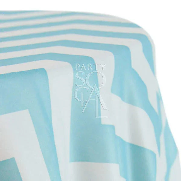 ROUND TABLECLOTH CHEVRON with blue and white stripes, ideal for enhancing special events with its premium design and versatile fit for various themes.