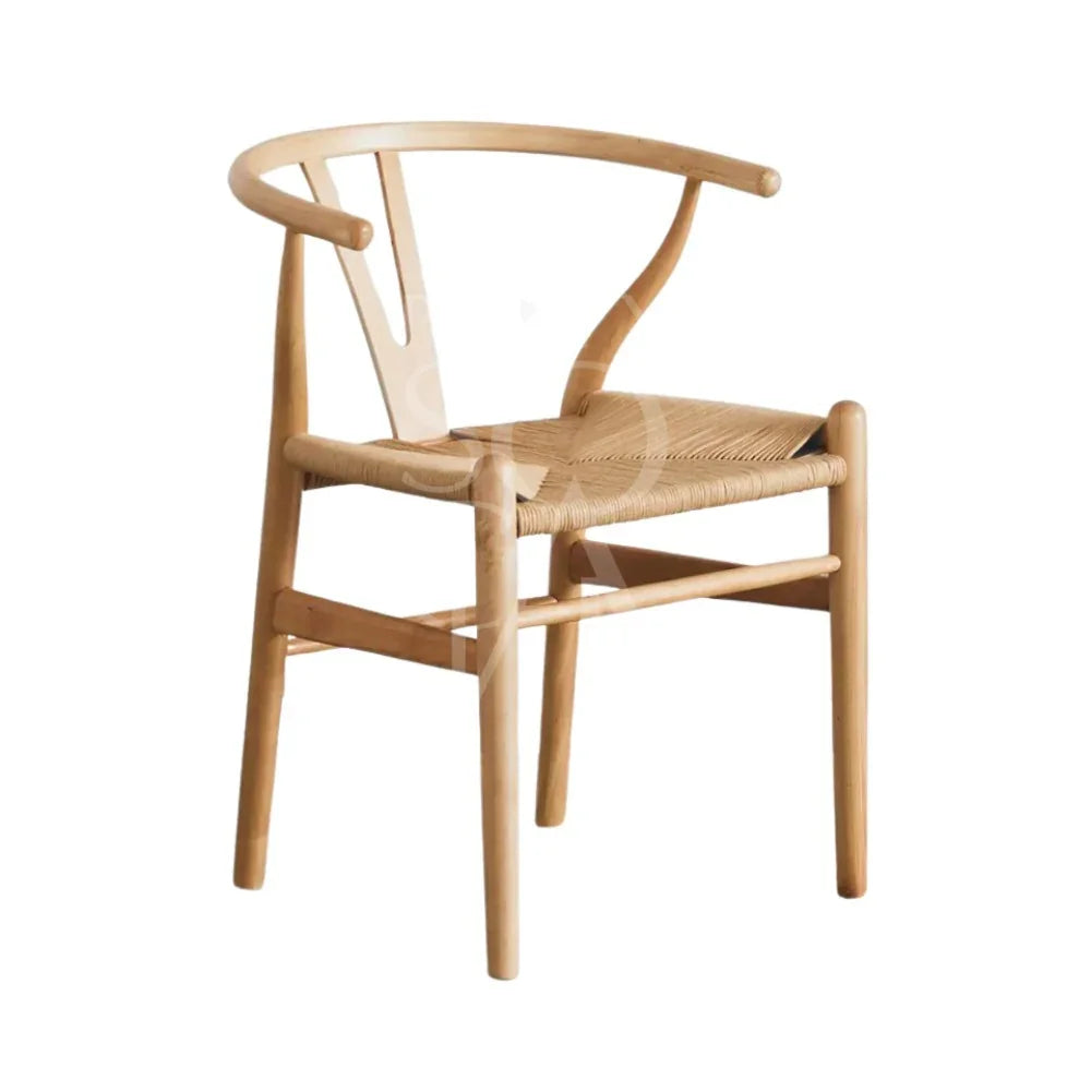 Wishbone Chair with a woven seat, ideal for modern, minimalist event settings, available through Party Social for elevating any occasion.