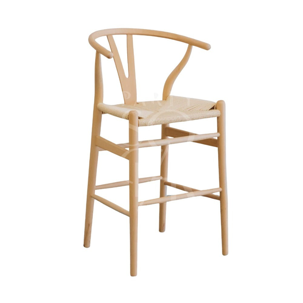 WISHBONE STOOL: A high-seat wooden stool featuring a woven seat, curved open backrest, and rounded legs with footrests, ideal for adding elegance to any event.