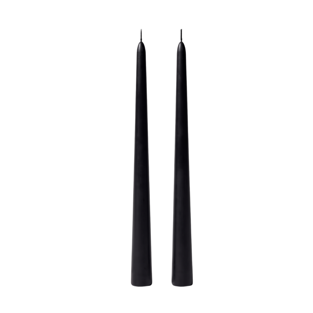 Two black taper candles standing upright side by side on a plain white background.