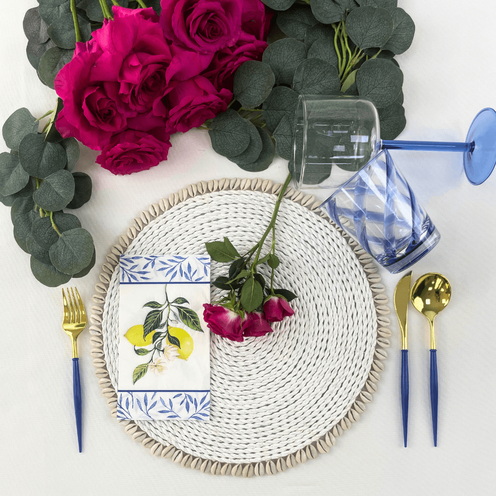 Capri Coast Paper Guest Towel Napkins featuring a floral design with roses, perfect for elegant dining setups. Ideal for parties and events. From Party Social, your go-to for party essentials.