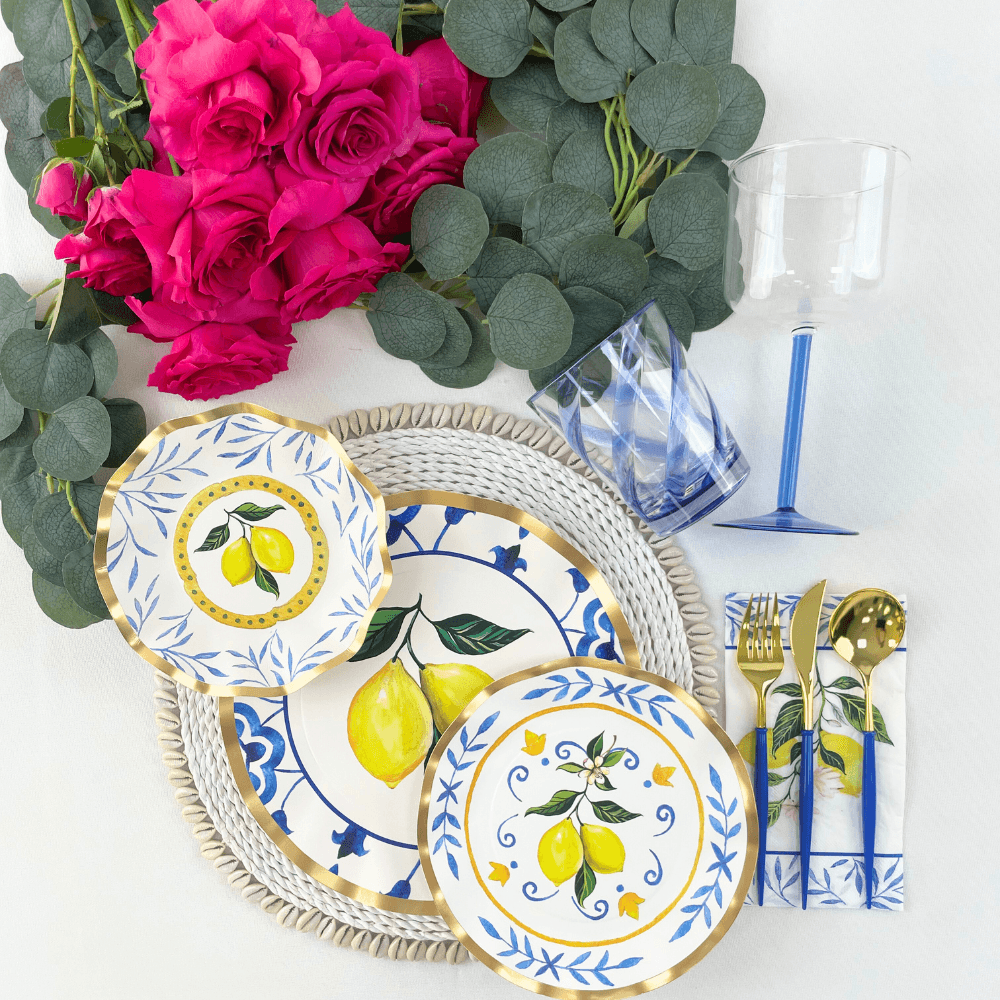 Color Stemmed Glass- 4 per box from Party Social: A clear plastic wine glass with a blue straw, perfect for events, adding a pop of color to tables and enhancing any styled event or dinner party.