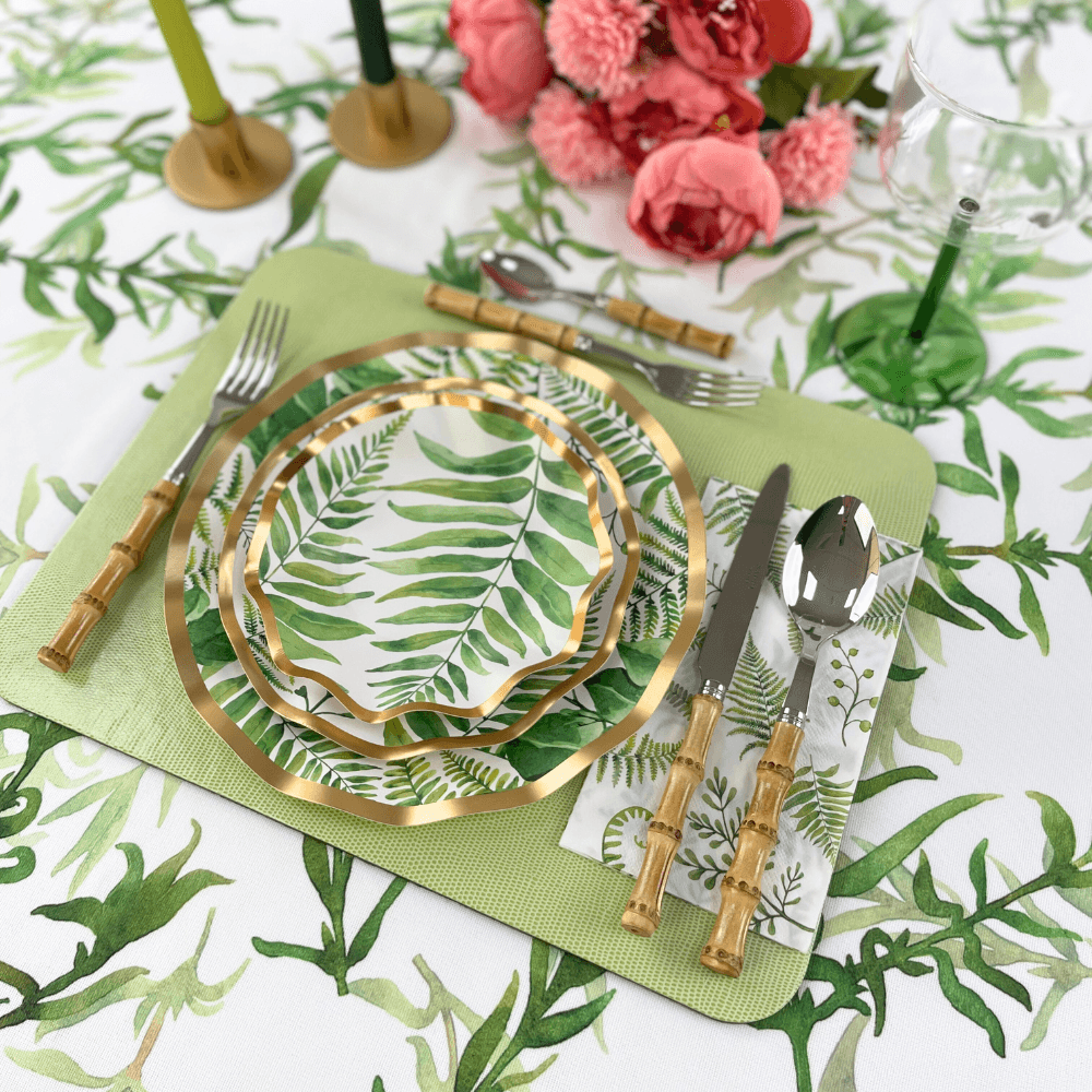 Fern & Foliage Paper Appetizer & Dessert Bowl-8 Per Package displayed on a table with elegant silverware. Perfect for adding style to events. From Party Social, your go-to for party essentials.