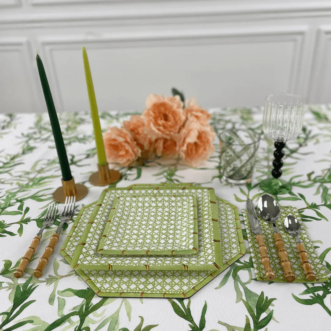 Four Ball Stemmed Glass-4 per box on a table adorned with candles, flowers, and green and white decor, ideal for elevating any event setting. Reflects Party Social&