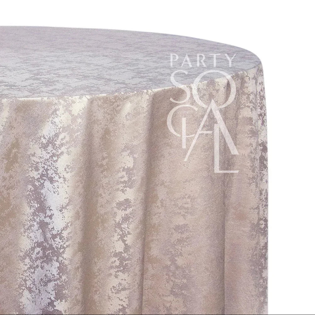 Round Jacquard tablecloth elegantly draped over a table, ideal for enhancing special occasion settings.