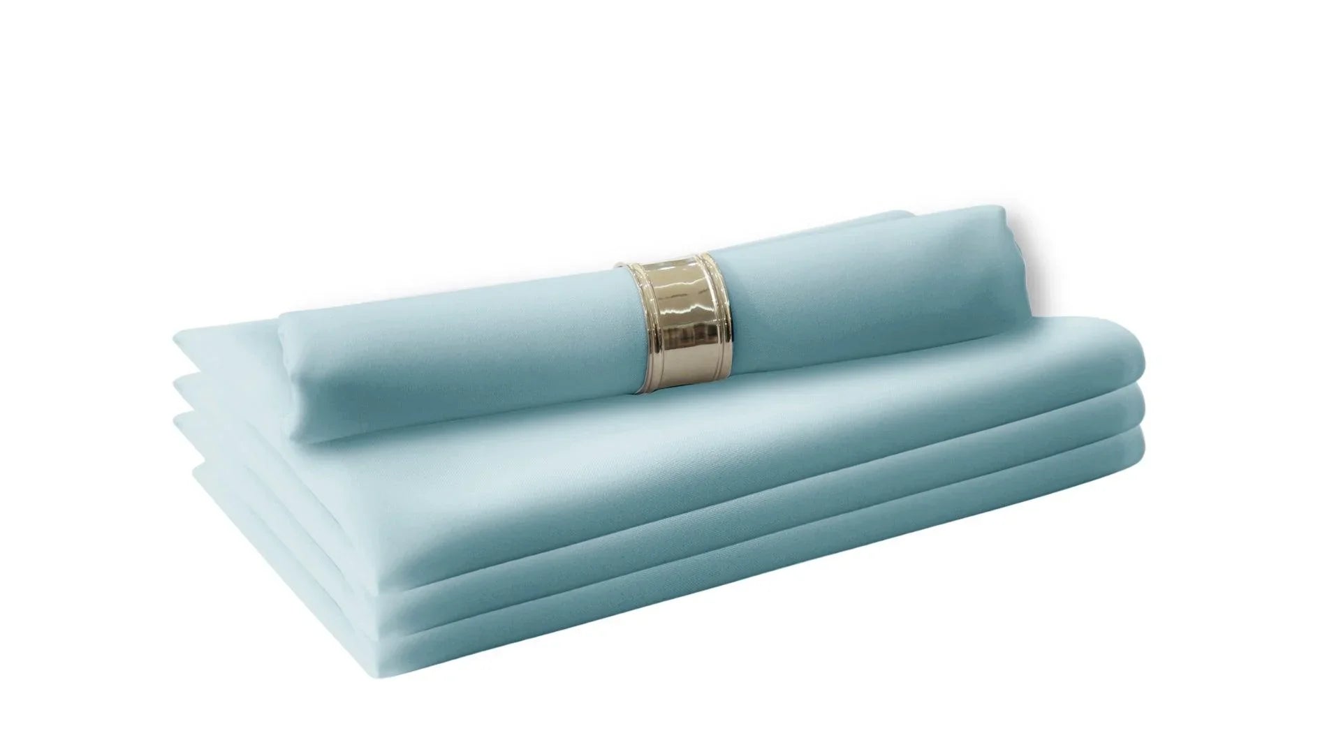 A stack of folded blue polycotton napkins, perfect for livening up your dinner table. Easy to wash and reuse, these napkins are a staple in your dining table linens. 4 per pack.