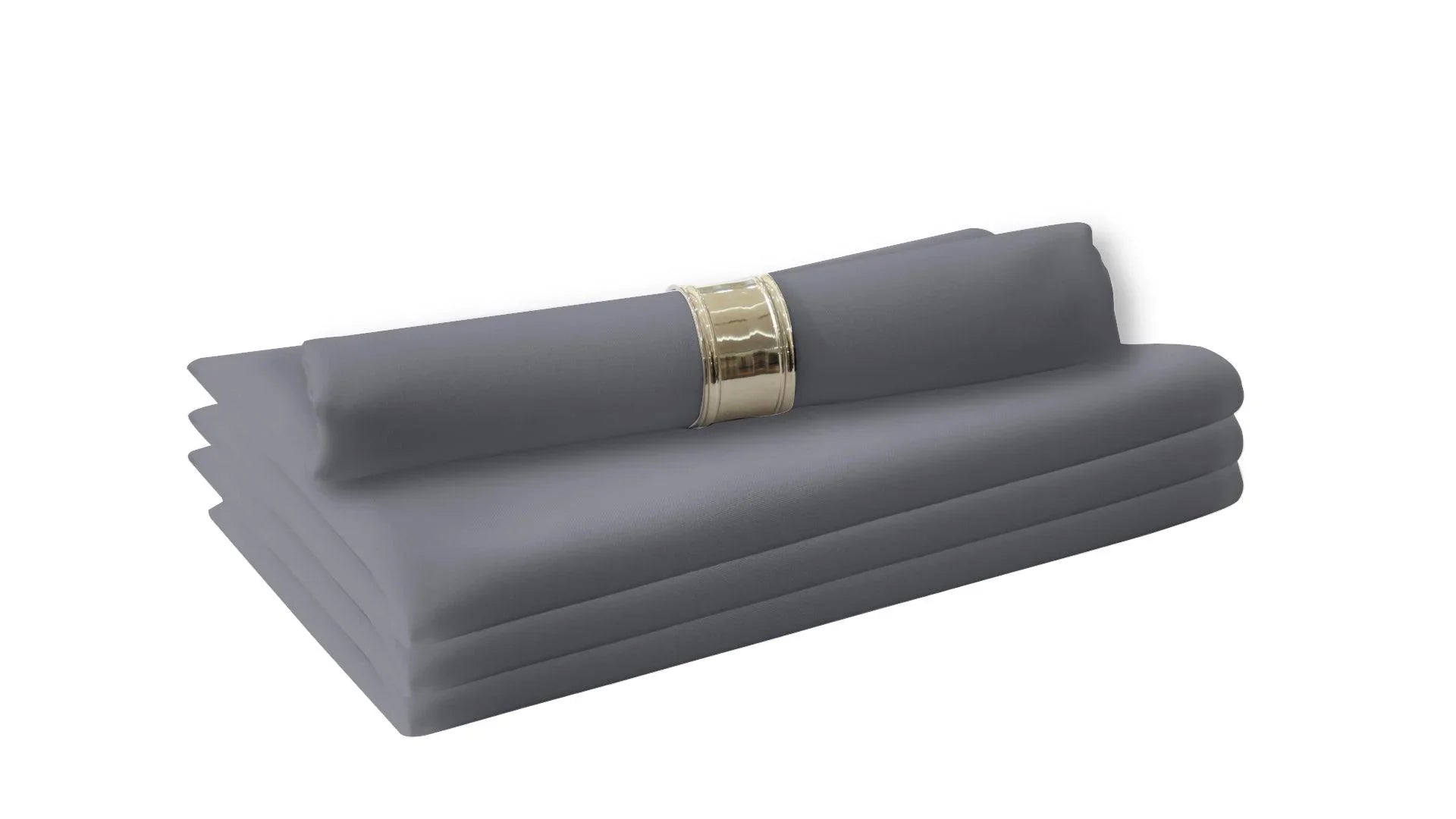 A stack of grey cloth dinner napkins, part of the Polycotton Napkins- 4 per pack collection, perfect for livening up your dinner table.