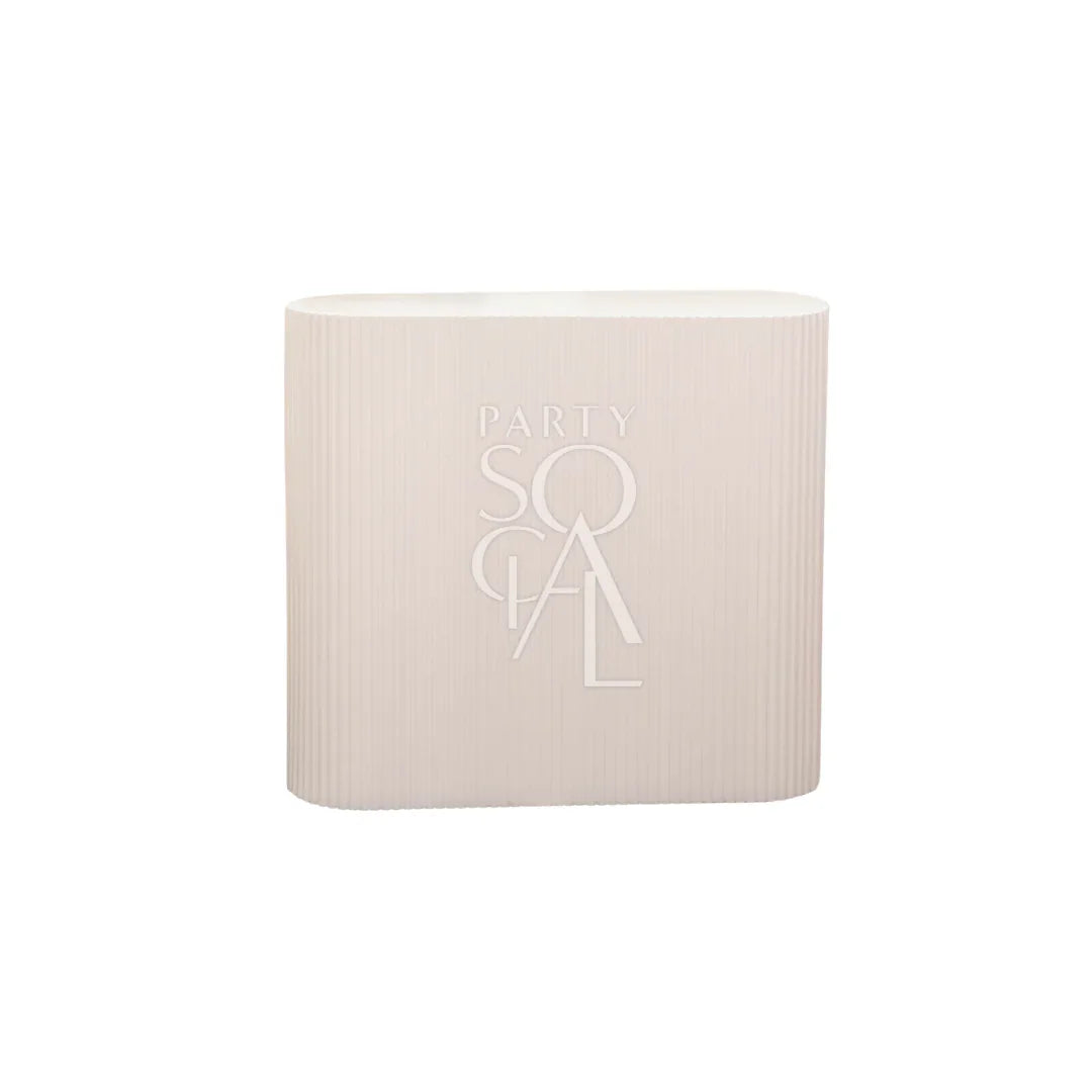 Rippled White Counter Podium with text detail, designed to enhance any event setting, available for rental or purchase from Party Social.