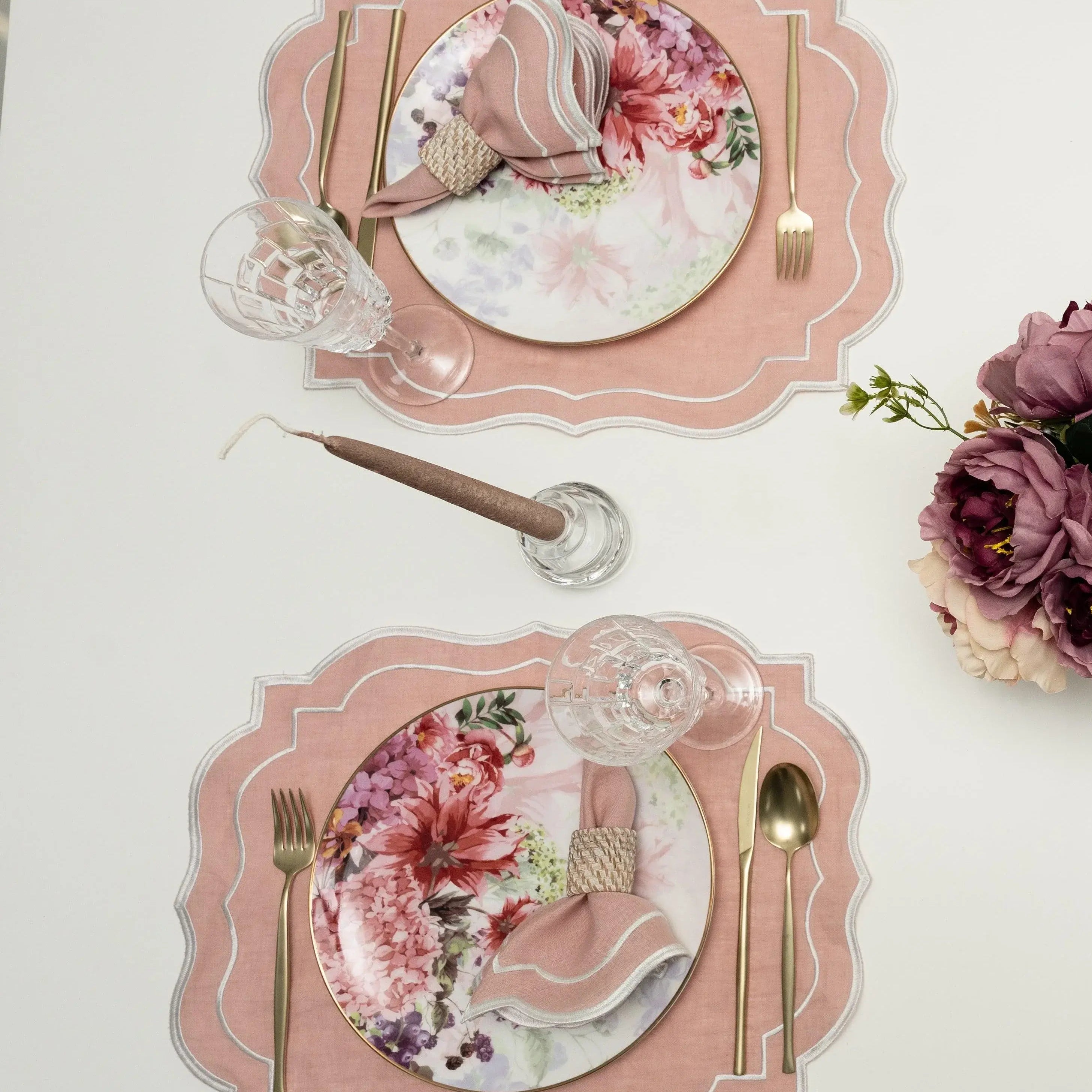 Blush Pink Scalloped Linen Placemats - Set of 4 elegantly styled with floral china, gold-tone flatware, and crystal glass, perfect for refined dining occasions.