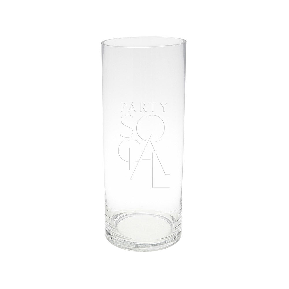 A cylinder glass vase, perfect for brightening tables or consoles. Available in various sizes: Extra Small, Small, Medium, and Large. Enhance your event decor with elegance. Flowers or candles can be added. Tableware from Party Social Dubai.