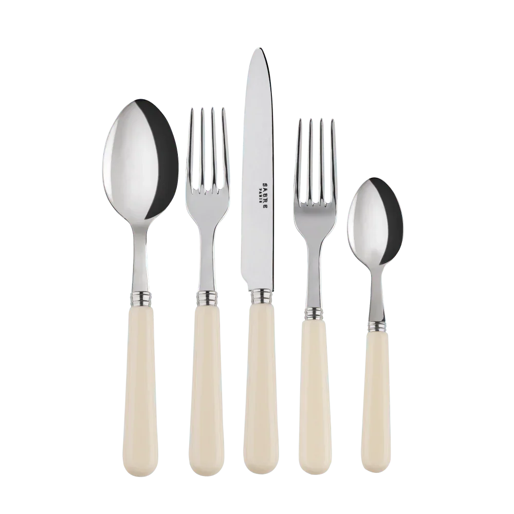 Ivory Cutlery Set of 5: A stylish kitchen utensil with a fork, knife, and spoon. Perfect for any table setup.