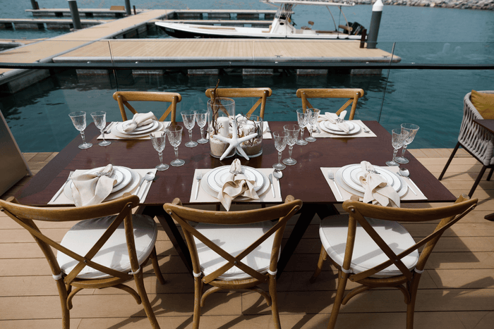 An image of a table with chairs, creating a welcoming and inviting atmosphere.