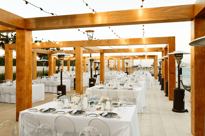 Timeless Elegance: Guests Enjoying an Elegant Welcome Dinner at the Bvlgari Yacht Club, Dubai